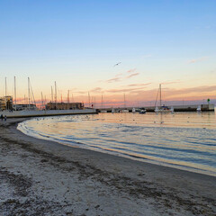 Gdynia beach in the colors of the setting sun, Poland