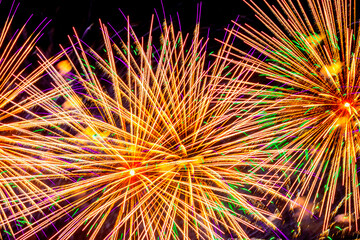 Chic colorful firework with multicolored glowing spheres, flickering stars. Bright holiday...