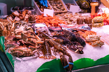 Different sorts of fish, crayfishes, crabs, molluscs, arthropods at fish market