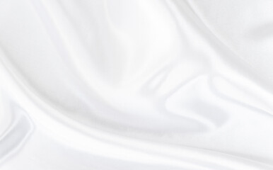 White gray satin texture that is white silver fabric silk background with beautiful soft blur pattern natural.