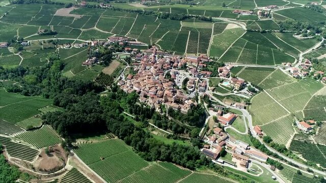 Aerial high altitude view of Barolo is a comune in the Province of Cuneo in the Italian region Piedmont located about 50 kilometres southeast of Turin and famous for its wine production 4k quality