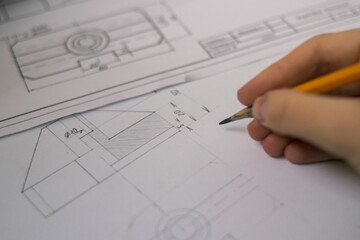 Drawing. Detail plan. Man's hand Pencil sharpened sharply. Constructions.