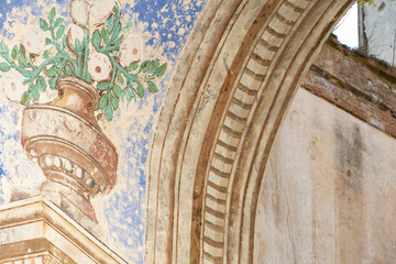 Lyskovo, Belarus, June 01.2019: Old dilapidated old dilapidated building with red brick columns. An old Church or Church with frescoes on the walls. Historical value and heritage of Freemasonry.