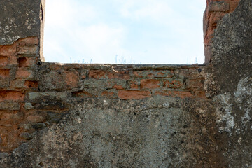 Destroyed building. Red brick castle built in the last century. Historical value. Restoration and restoration of cultural property.