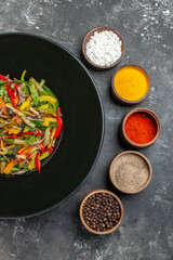 top view tasty vegetable salad with seasonings on the grey background color food photo meal health