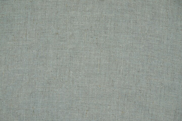 Fototapeta na wymiar Natural linen surface. High resolution cotton canvas texture. Copy space. Top view.