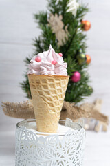 Marshmallow in a horn on a light background