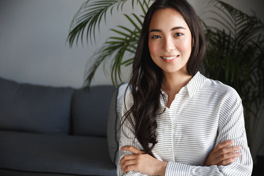 Young Asian Woman Professional Looking At Camera With Confidence, Working From Home Office And Smiling