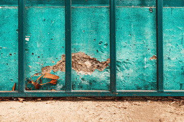 Urban texture background, worn turquoise concrete wall surface
