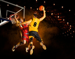 Two basketball players in action - obrazy, fototapety, plakaty