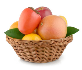 Fruits in basket on white background