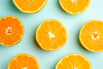 top view fresh tangerine slices on light-blue background photo fruit color juice citrus orange