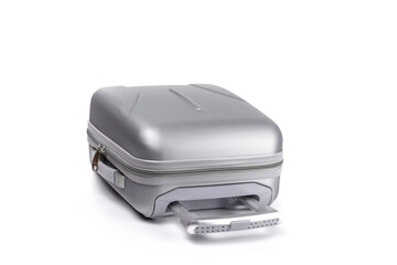 Travel suitcase isolated. Silver plastic luggage or vacation baggage bag on white background. Design of summer vacation holiday concept.