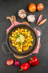 top view fried potatoes inside pan with vegetables on dark-grey background cuisine meal food color dish dinner