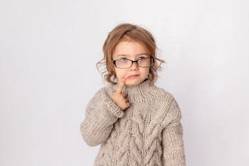 small child girl with glasses on white background, space for text