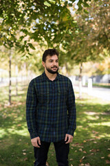 Autumn lifestyle, Bearded man standing in outdoors park