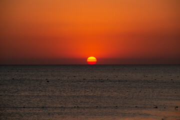 Sunset on the background of the sea