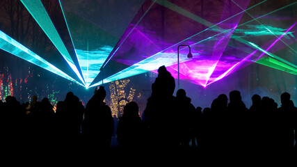 Night laser show with audience