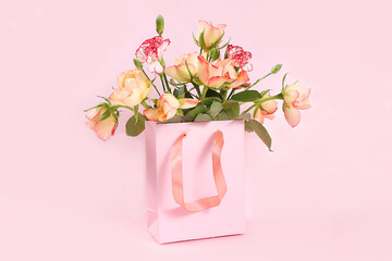 Concept for Valentine's Day or Women's Day. Postcard, hearts and flowers in gift boxes on a pink background, place for text, banner, Happy holidays, congratulations, birthday, wedding, selective focus