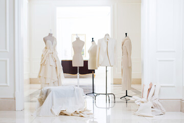 Sartorial mannequin and designer dress in showroom  - obrazy, fototapety, plakaty