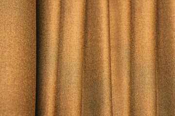 Detail of woven woolen design texture. Fabric brown background