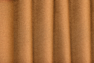Detail of woven woolen design texture. Fabric brown background
