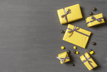 gift shopping box delivery yellow gray background top view