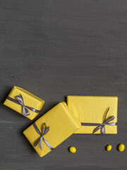 gift shopping box delivery yellow gray background top view