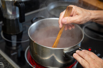 melting the chocolate in the saucepan at home