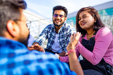 infian best friends spending time together outdoors in spring park