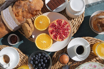breakfast brunch with toast bread coffee tea orange pomegranate salmon