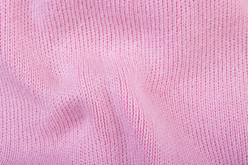 Texture of pink cotton fabric as background