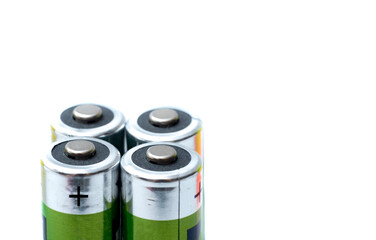 four battery plus poles and isolated background with white