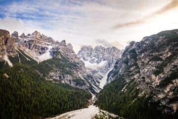 aerial view on snow covered mountains in the alps