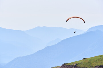 paraglider over the mountains