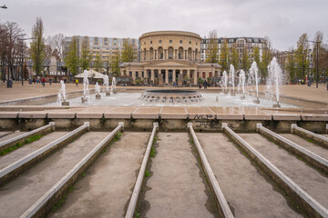 Fototapeta premium Paris, France - 12 12 2020: View of the Basin of the villette and the The Ledoux rotunda at sunset