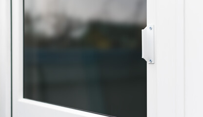 External handle of the new white plastic door