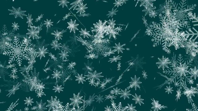 Fiocchi di neve bianchi su sfondo verde scuro.