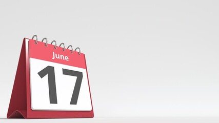 June 17 date on the flip desk calendar page, blank space for user text, 3d animation