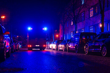 Ambulance at night, blue light, fire department, berlin, germany, out of focus photographed,...