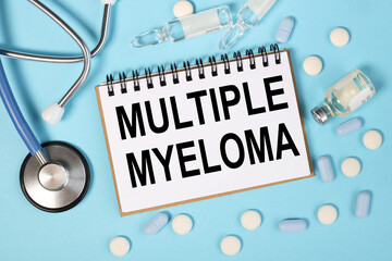 multiple myeloma, text on white paper near stethoscope on blue background