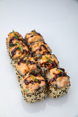 Japanese cuisine. Sushi roll on white background.