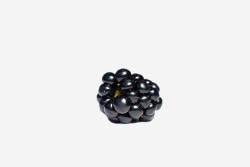 Blackberry isolated, on white background, white clipping path, closeup side view, macro photo
