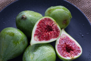 Fresh ripe figs on a plate. Mediterranean fruit background.