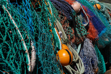 Bright and colourful fishing nets and buoys.