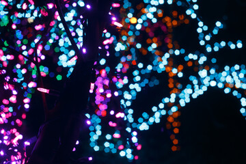 An Array of Blue and Purple Bokeh Christmas Lights at the Festival