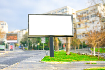 Blank billboard mock up, public information board with copy space on the street, empty banner for your advertising, clear poster in city.