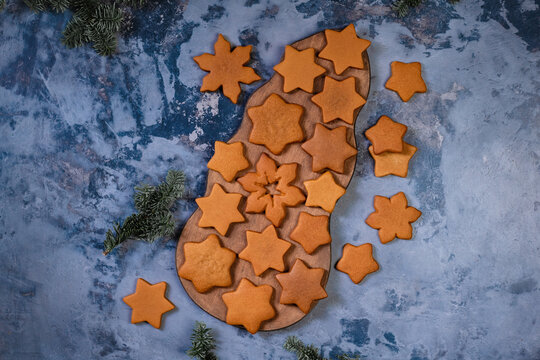Gingerbread cookies on a wooden board