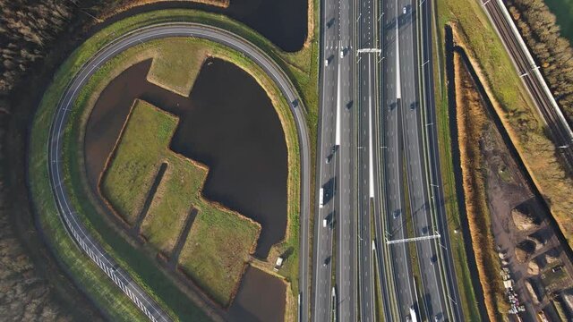 A1 and A6 highway in holland The Netherlands top view on a highway crossing multple lanes with traffic going over