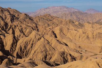 Coloured Canyon in Dahab on South Sinai (Egypt) peninsula. Desert rocks of multicolored sandstone background..